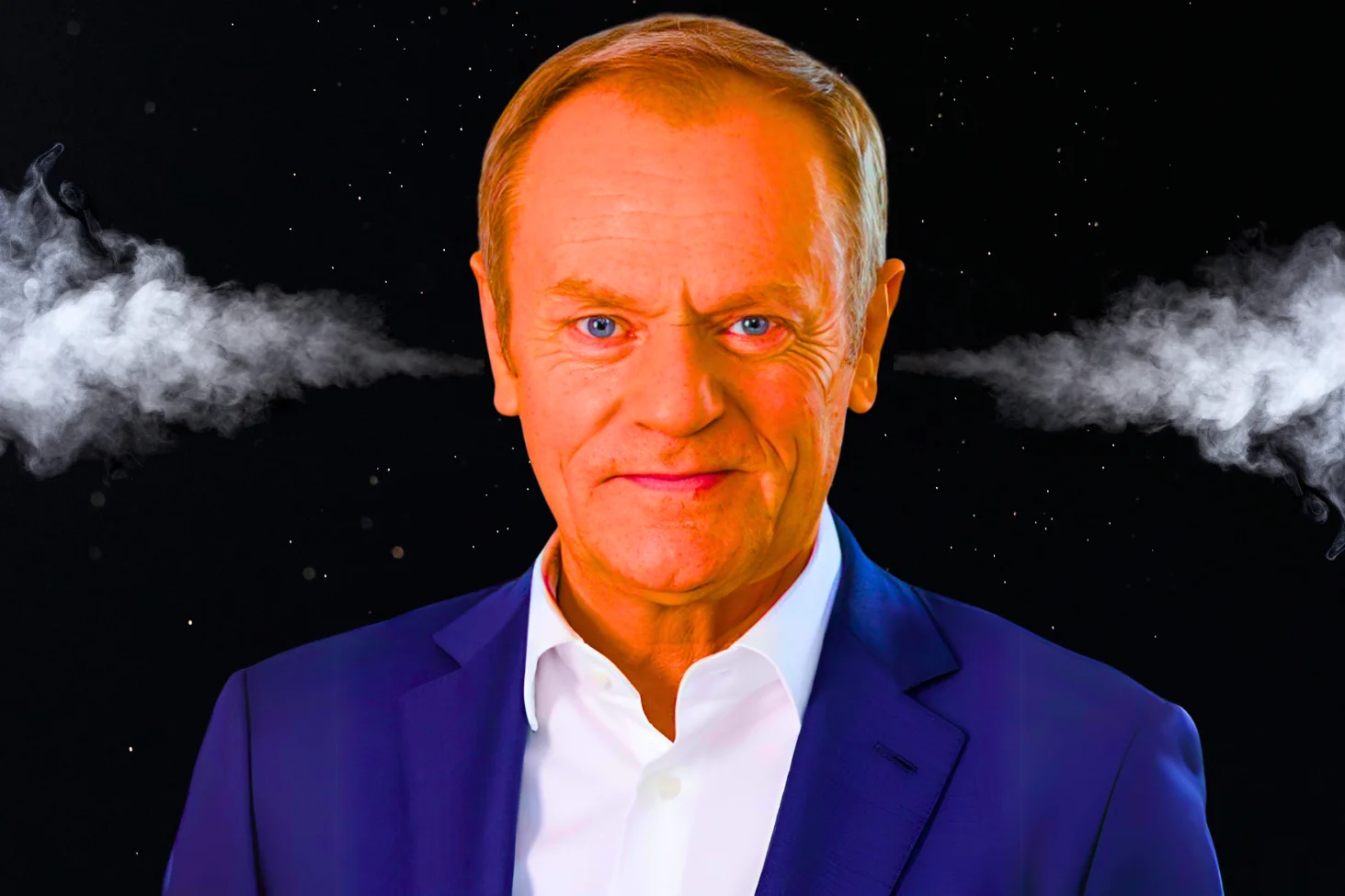 Na zdjęciu widzimy Donalda Tuska, który ma czerwoną twarz.